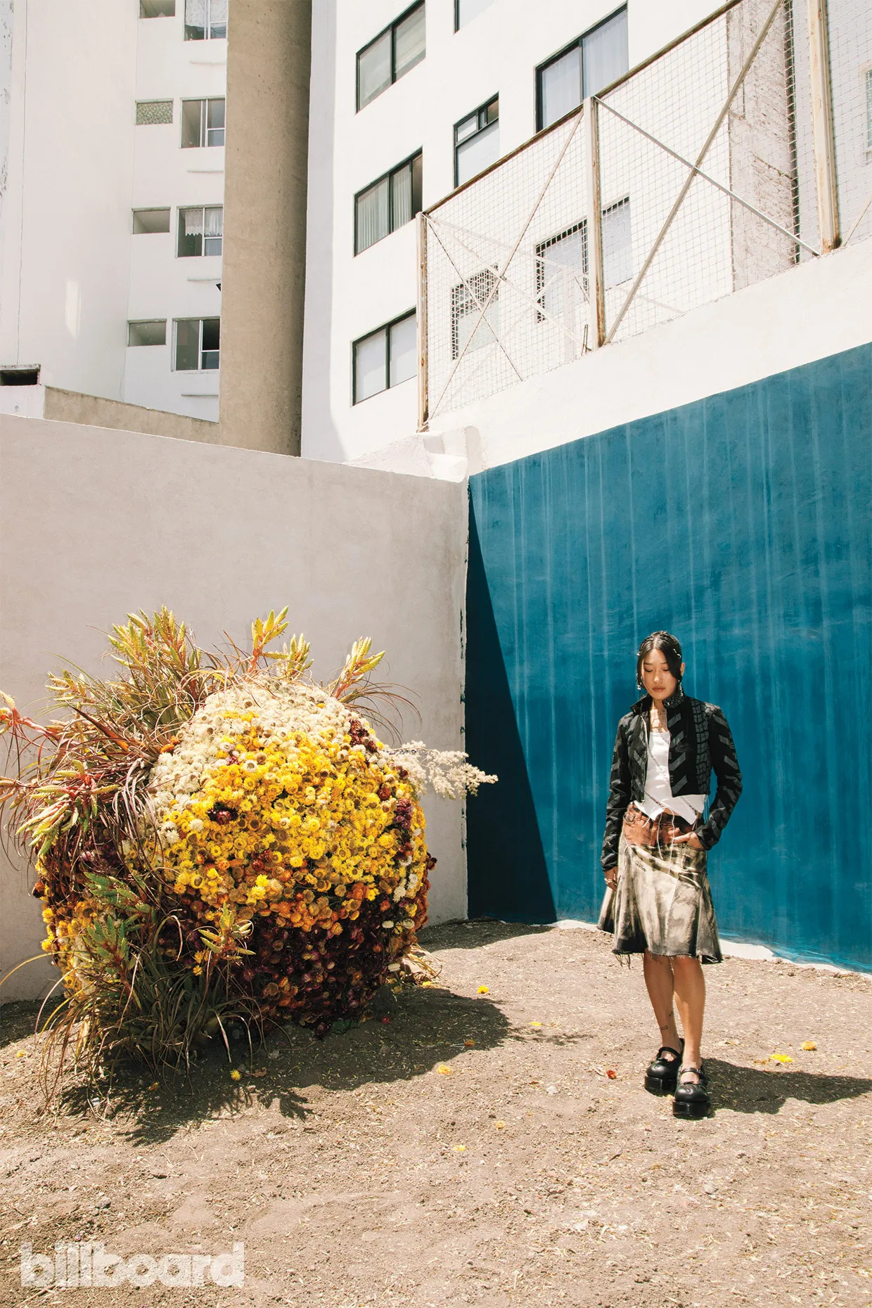 Cueva top and skirt, Ket Void jacket, Cruda shoes. Floral Art Installation by Flores Cosmos.