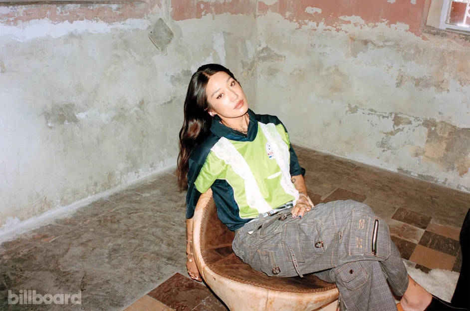 Peggy Gou photographed March 26, 2024 at Maison Celeste in Mexico City. Sentimiento top, Tiempos pants, Tercer Mundo belt, Frank Zapata shoes, AYANEGUI necklace. Batán Chairs by Taller Batán.